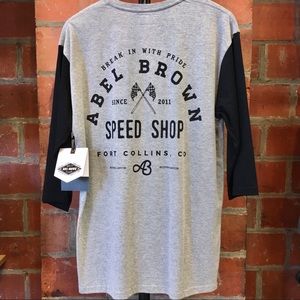 Abel Brown Rally Graphic henley shirt.